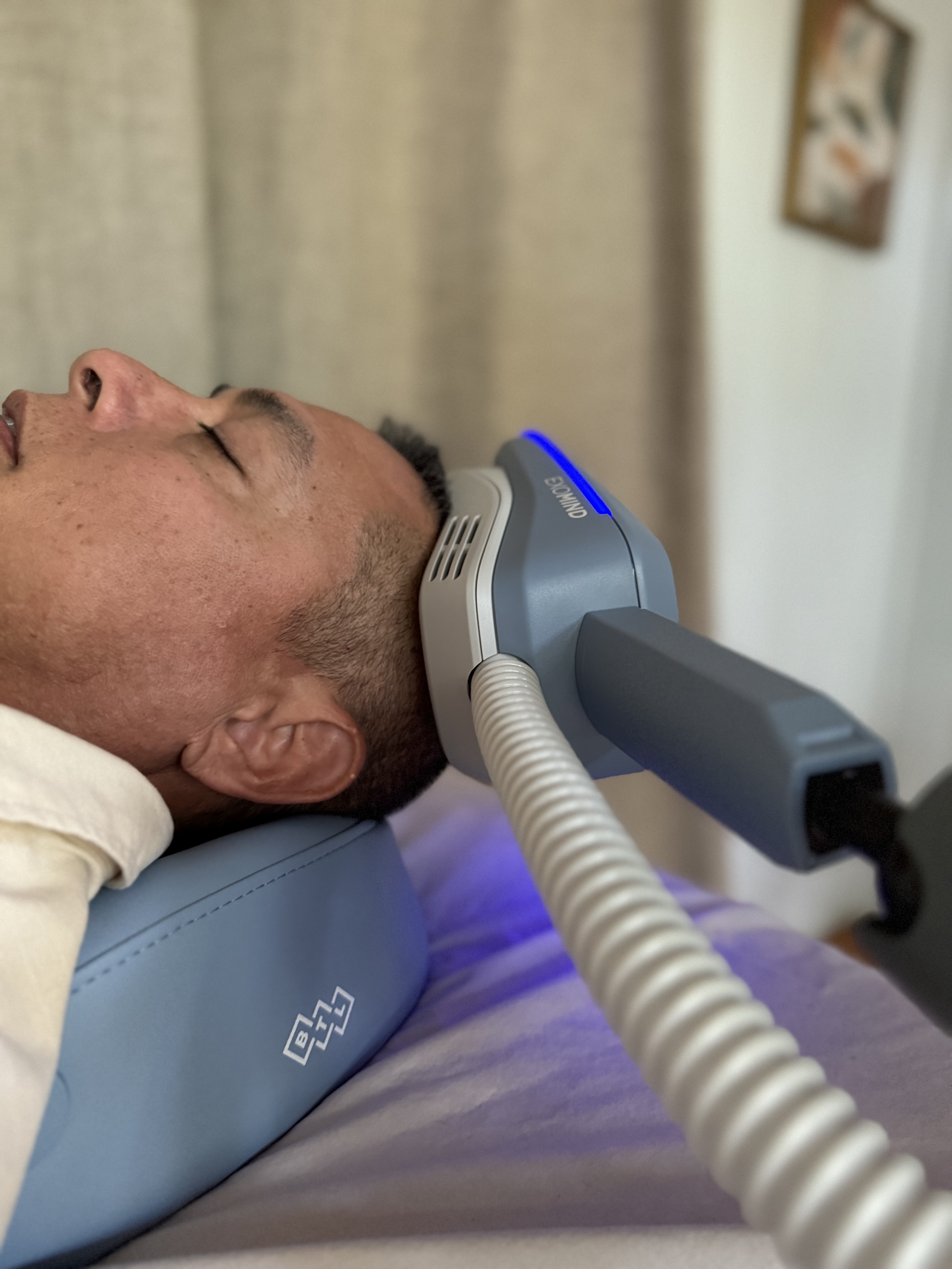 Patient undergoing TMS