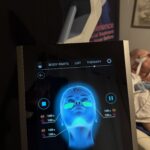 Paradise Medical Maui, EMFACE device showing treatment areas on a face graphic. Text: EMFACE, BODY PARTS, THERAPY.