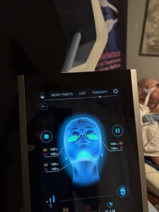 Paradise Medical Maui, EMFACE device showing treatment areas on a face graphic. Text: EMFACE, BODY PARTS, THERAPY.