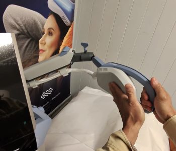 Paradise Medical Maui, Exomind TMS depression treatment device being prepared for use.